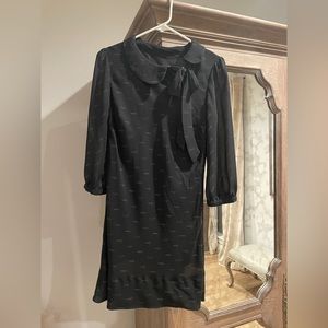 Vintage, cute black dress with daggers and swords print